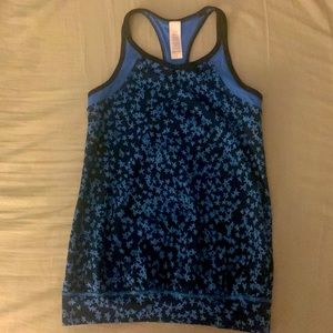 Girls Ivivva size 8 tank. Black with blue stars.